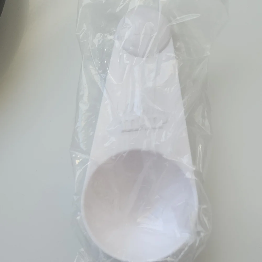 White Plastic Measuring Scoops for Parties